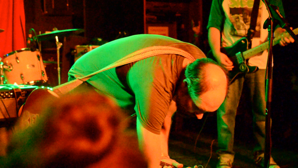 Doug Martsch adjusts his guitar pedals at Jack Rabbits in Jacksonville, FL