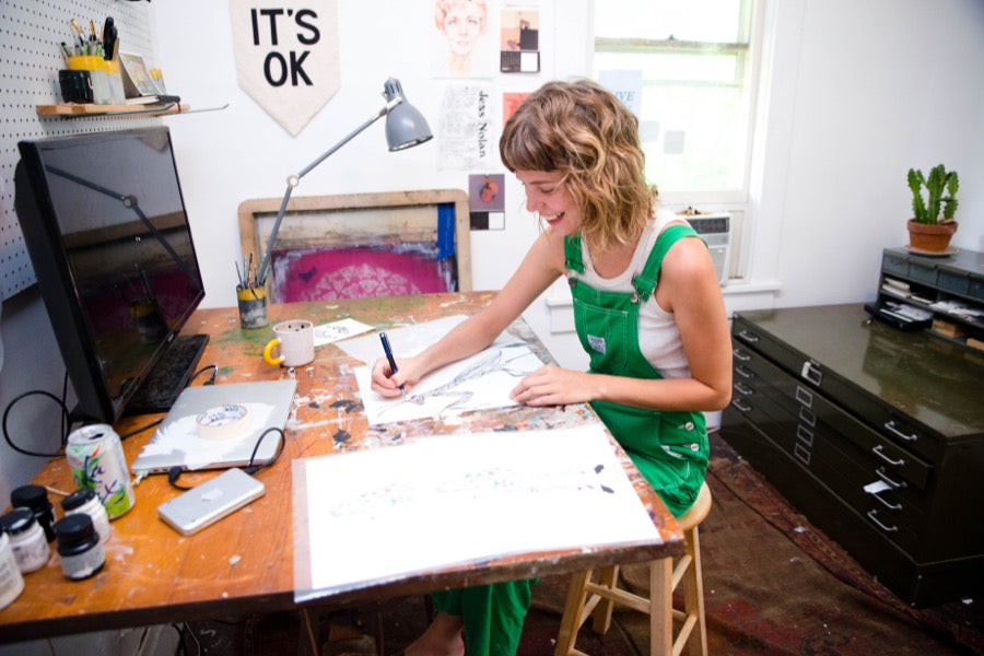 Nashville artist Emily Miller working in her studio. 