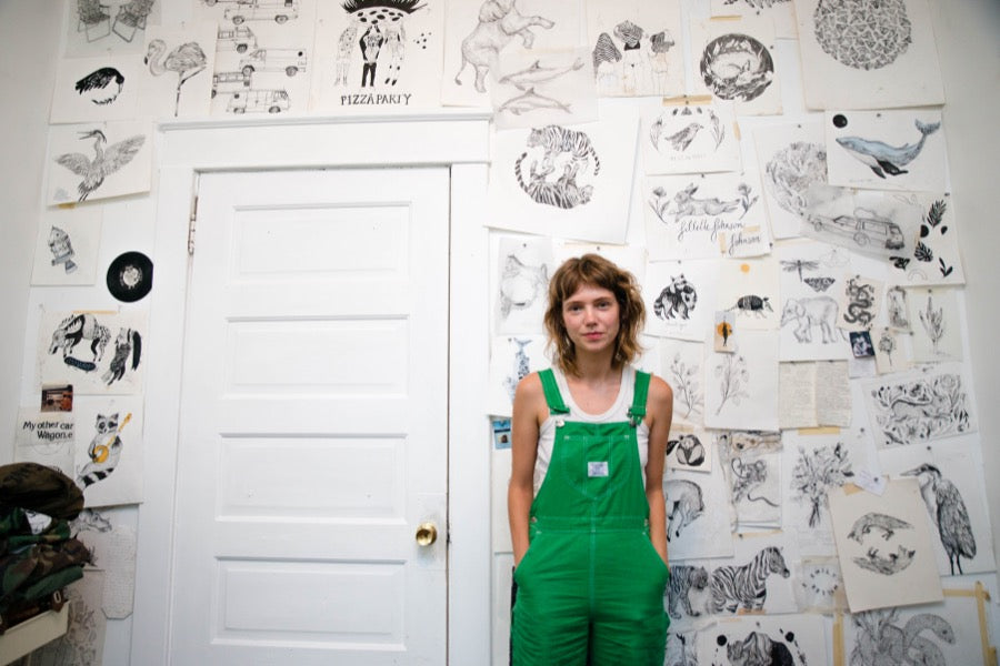 Nashville artist Emily Miller standing in her studio. 