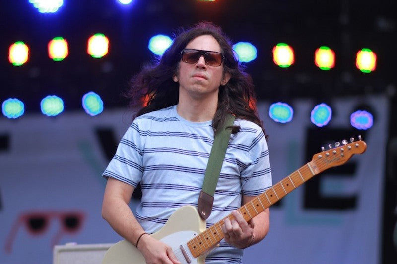 Jesse Trbovich wears the solid strap in green by Original Fuzz on his cream telecaster