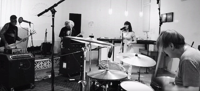 Old photo of the Melvins in the recording studio