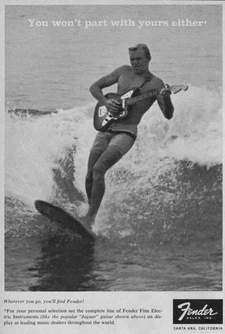 Vintage Fender ad from the 1960s with a surfer riding a wave with his guitar