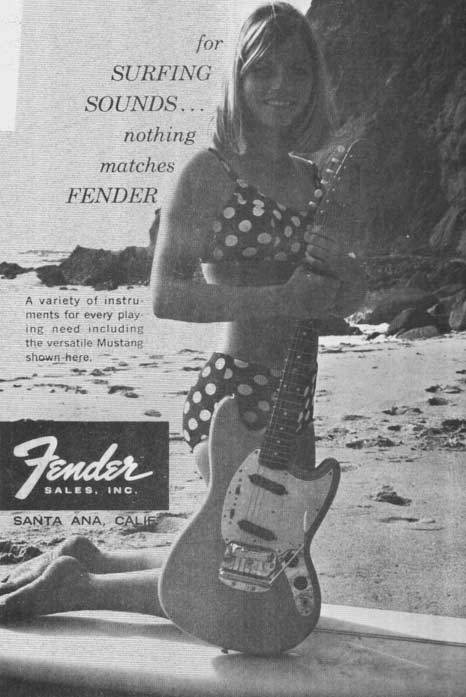 Vintage Fender print ad with girl in bikini on the beach and a Stratocaster