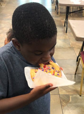 black boy eating cookie