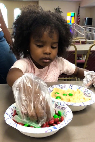 Black girl making cookies