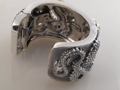 Double Dragon Cuff in Sterling, 18kt. Backside view.