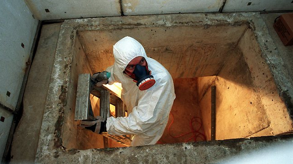 man removing asbestos