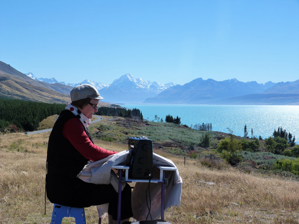 Susan quilting in mountains