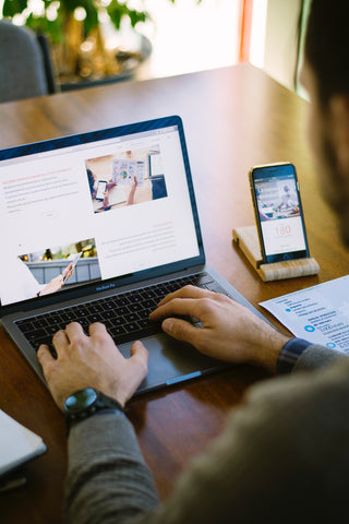 Closeup of Man Working On Laptop