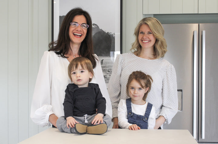 Founders Anita and Georgina with their children