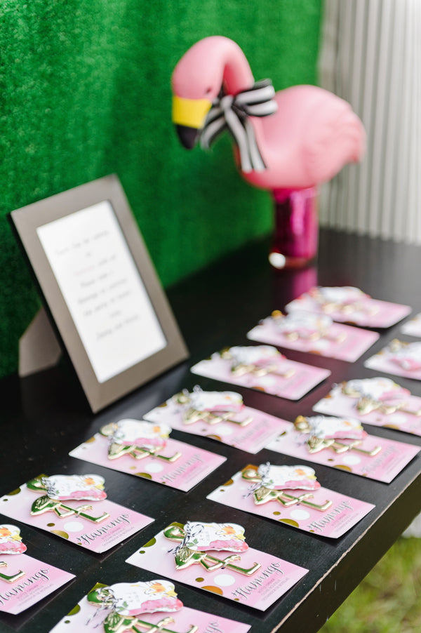 Thank guests for coming to flamingle with a cute favor display! | A Retro Flamingo Engagement Party | Two Prince Bakery Theater | Marc Edwards Photographs