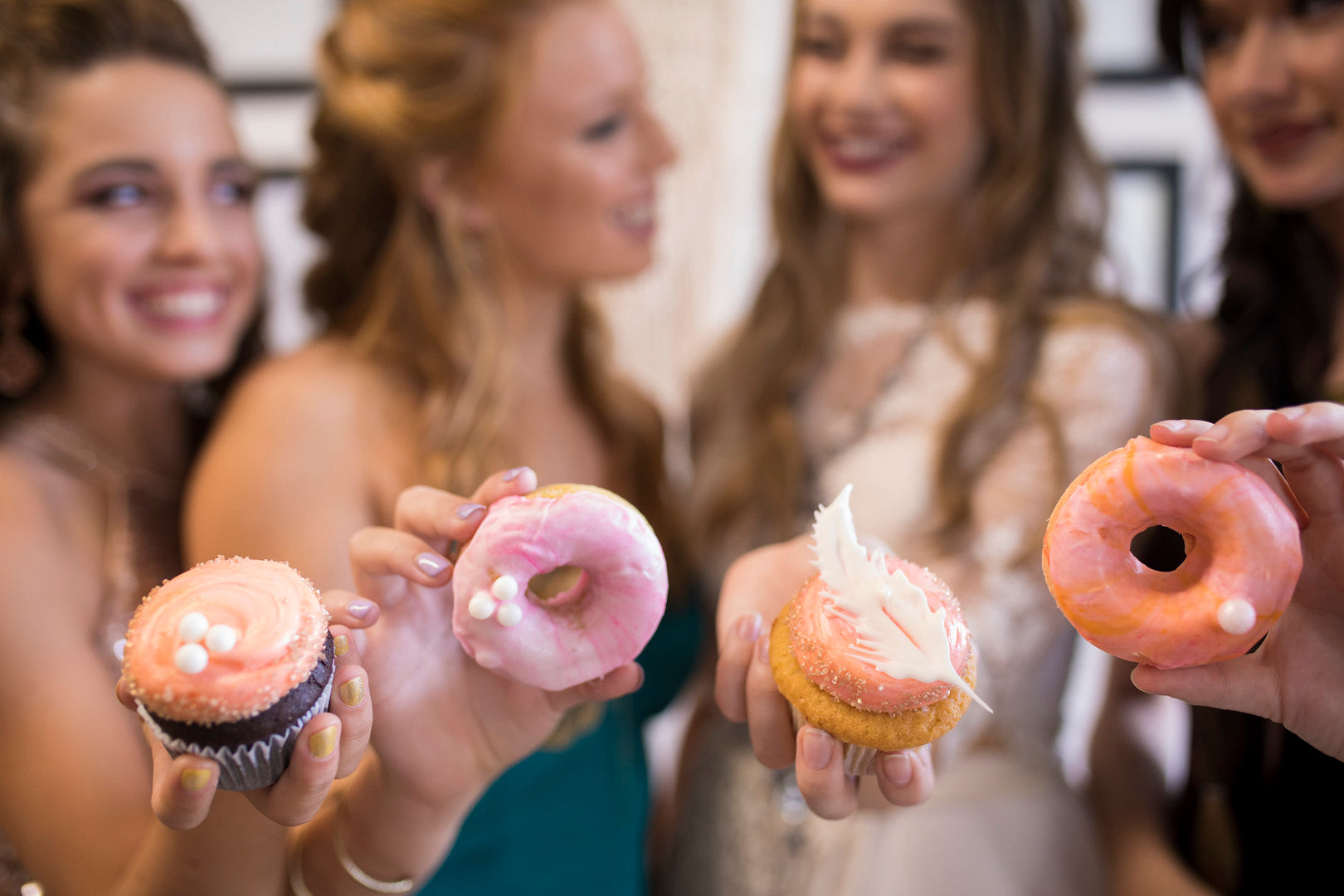 Girls Holding Donuts | A Super Bohemian Sweet 16 Soiree | Kate Aspen