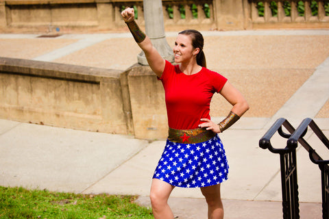 Model pictured wearing Woman of Steel skirt and gold BOLDER sleeves