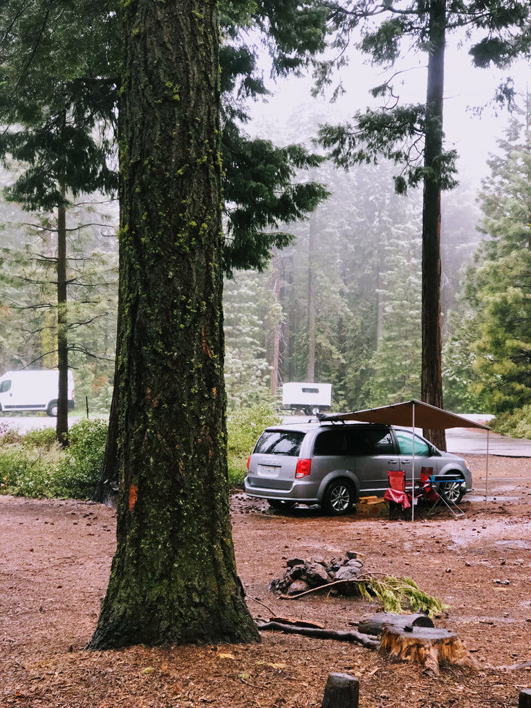 campervan camping in the forest near Yosemite - snow