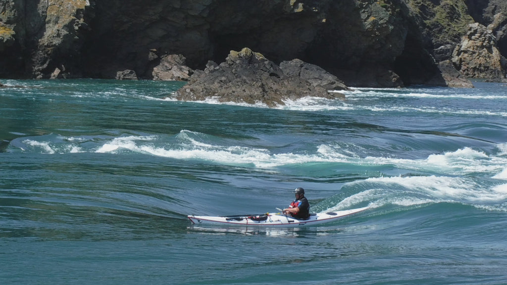 Paul Bramble having a surf on a tide race