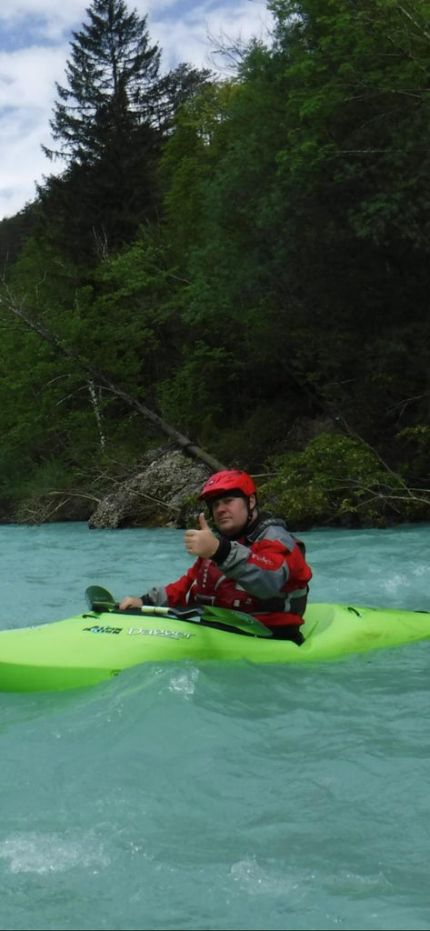 Paul on crystal clear waters of the river Soca, Slovenia