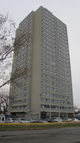 High rise residential building where electric bed bug heaters are used to kill bed bugs, bed bug eggs and bed bug nymphs using the power take off gear connected to the truck engine under the hood.