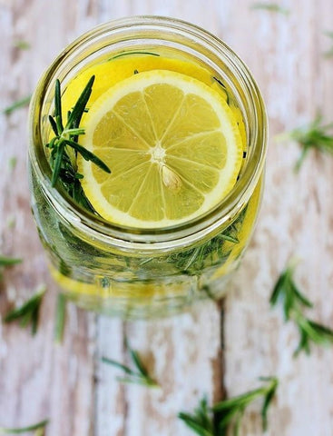 natural air freshener made from from herbs and fruit in mason jar