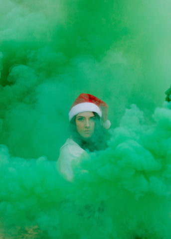 Red and green smoke bomb grenade for holiday photoshoot