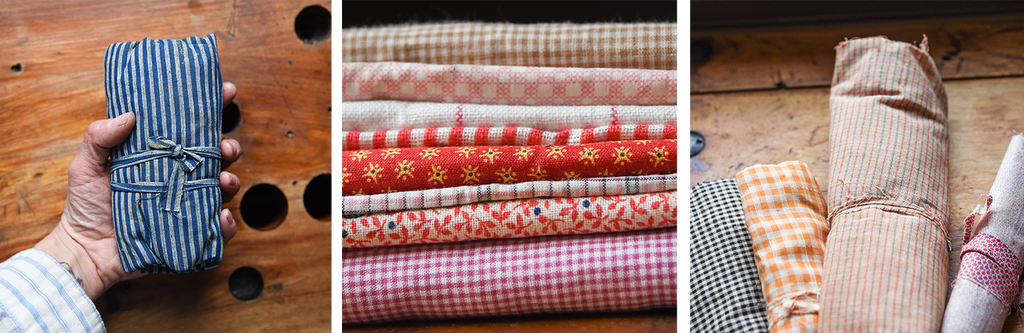 Stacks and rolls of colorful antique fabric 