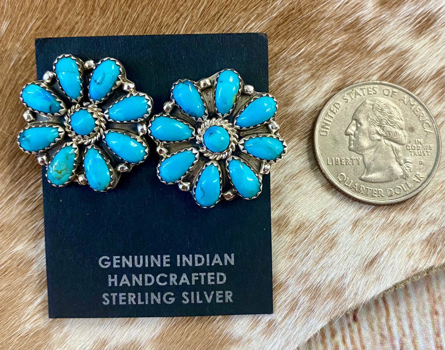 Beautiful sterling silver simple and fun Native made turquoise post cluster earrings. These earrings are stamped sterling and signed on the back by Native American artist silversmith. The perfect everyday or dress up earrings! Size: 1” inch length x 1” inch width Signed: YES "OM" Stone: Turquoise
