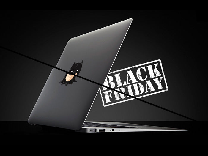 black friday sale and macbook with glowing decal