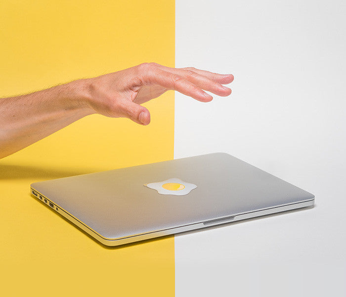 macbook with glowing egg sunny side up tabtag
