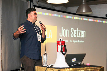 speaker jon setzen with custom tabtag macbook sitcker