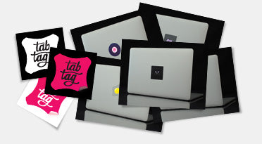 photo of versions of the tabtag logo and tabtags on a macbook