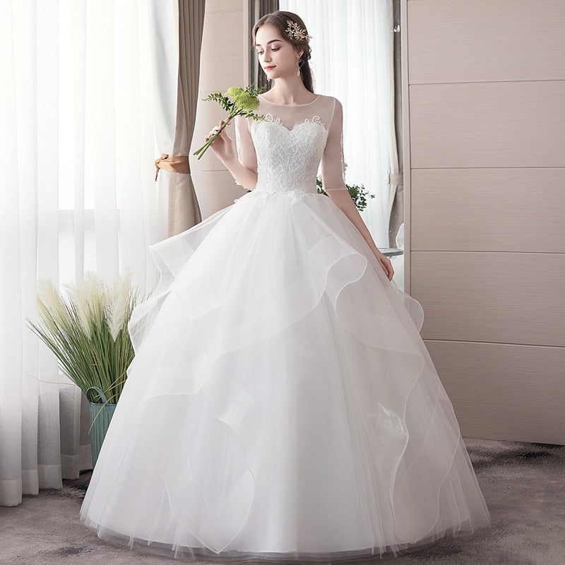 Wedding dress with multi-tiered skirt