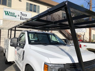 custom built truck rack with over cab roofing