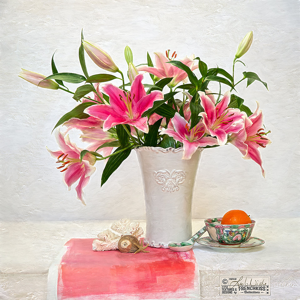Lilies and orange still life photograph by Leslie Nicole with texture and Topaz Labs filters.