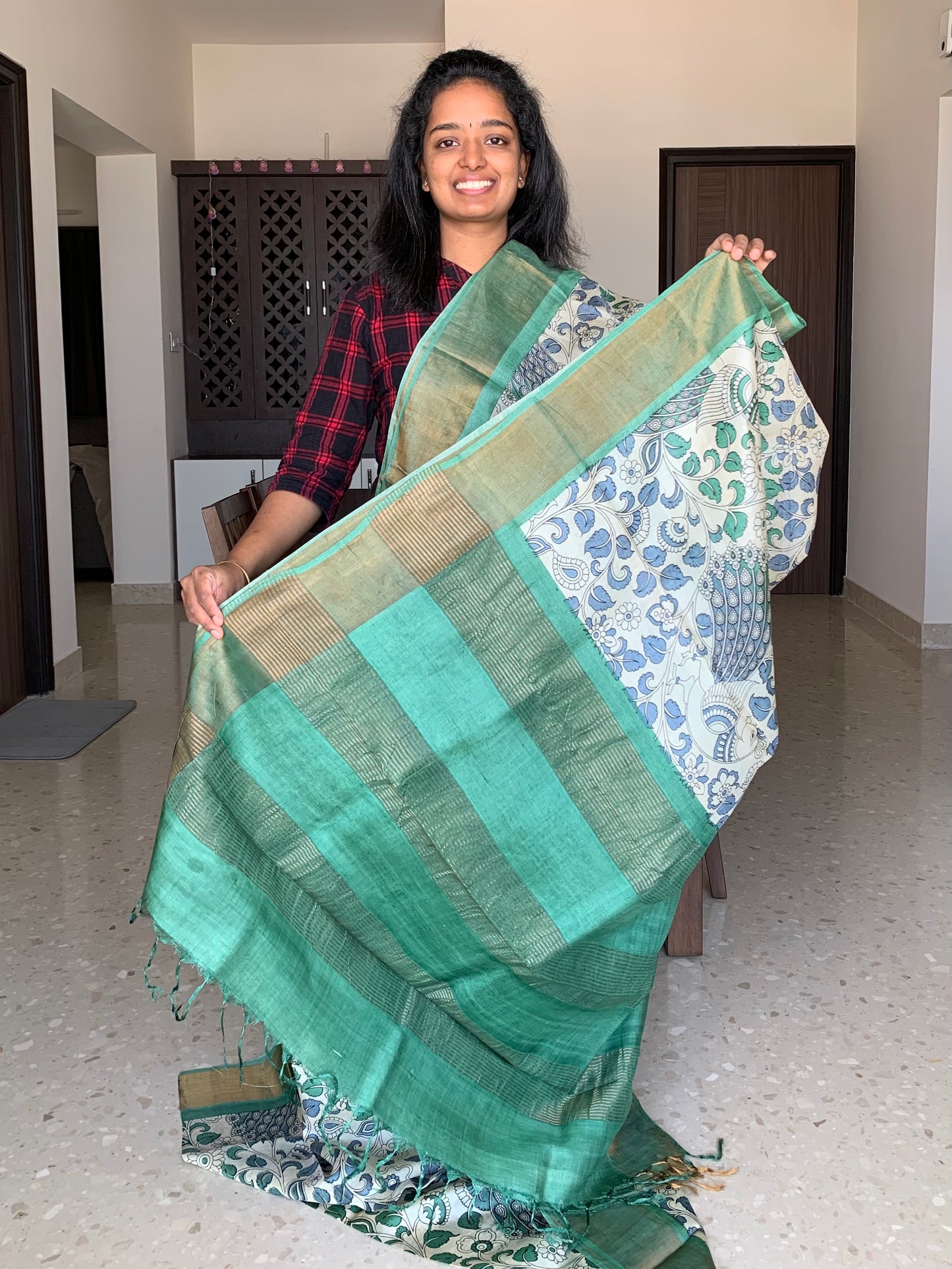 Cream and Green Tussar Silk Saree with Kalamkaari Prints