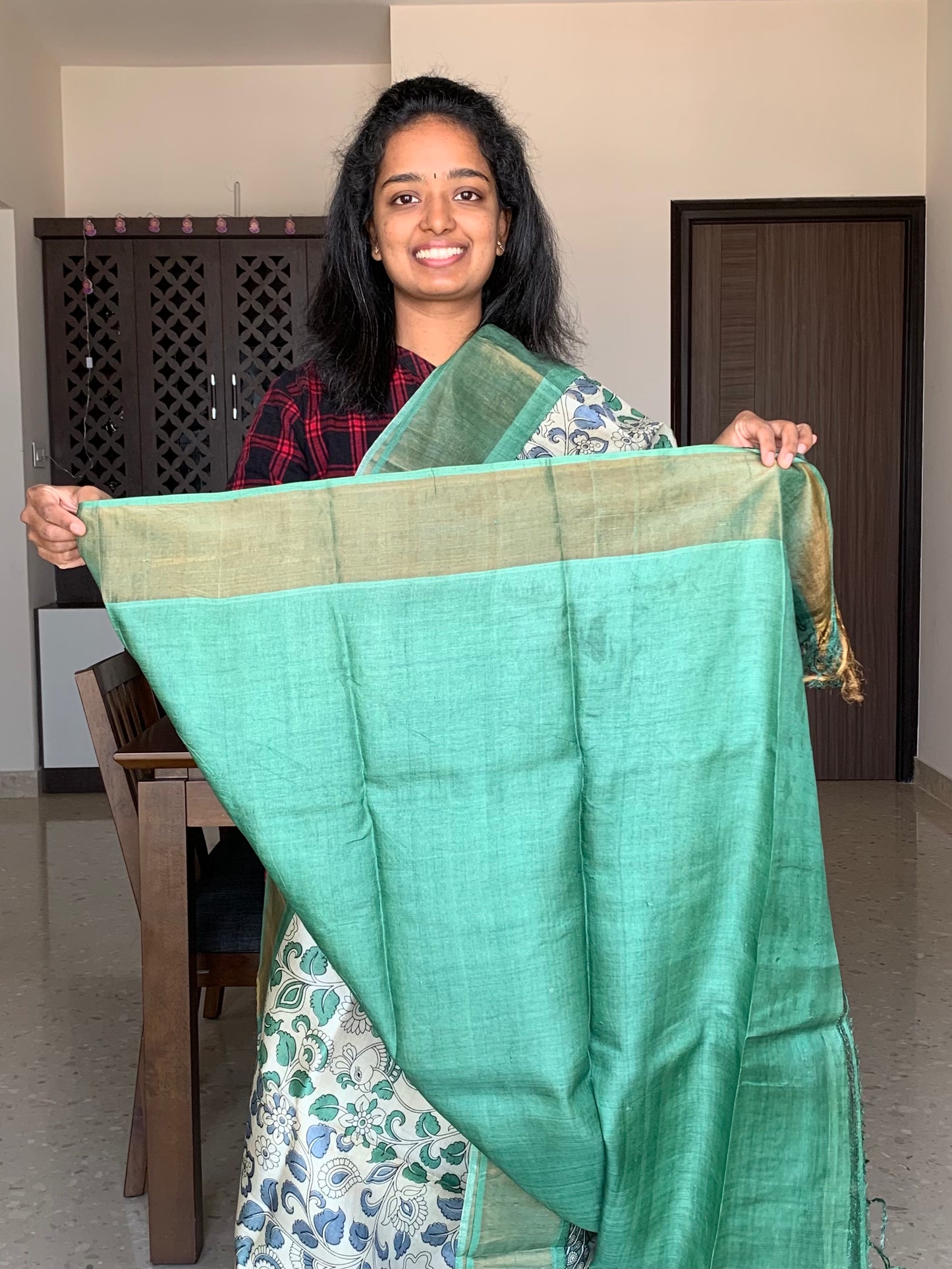 Cream and Green Tussar Silk Saree with Kalamkaari Prints