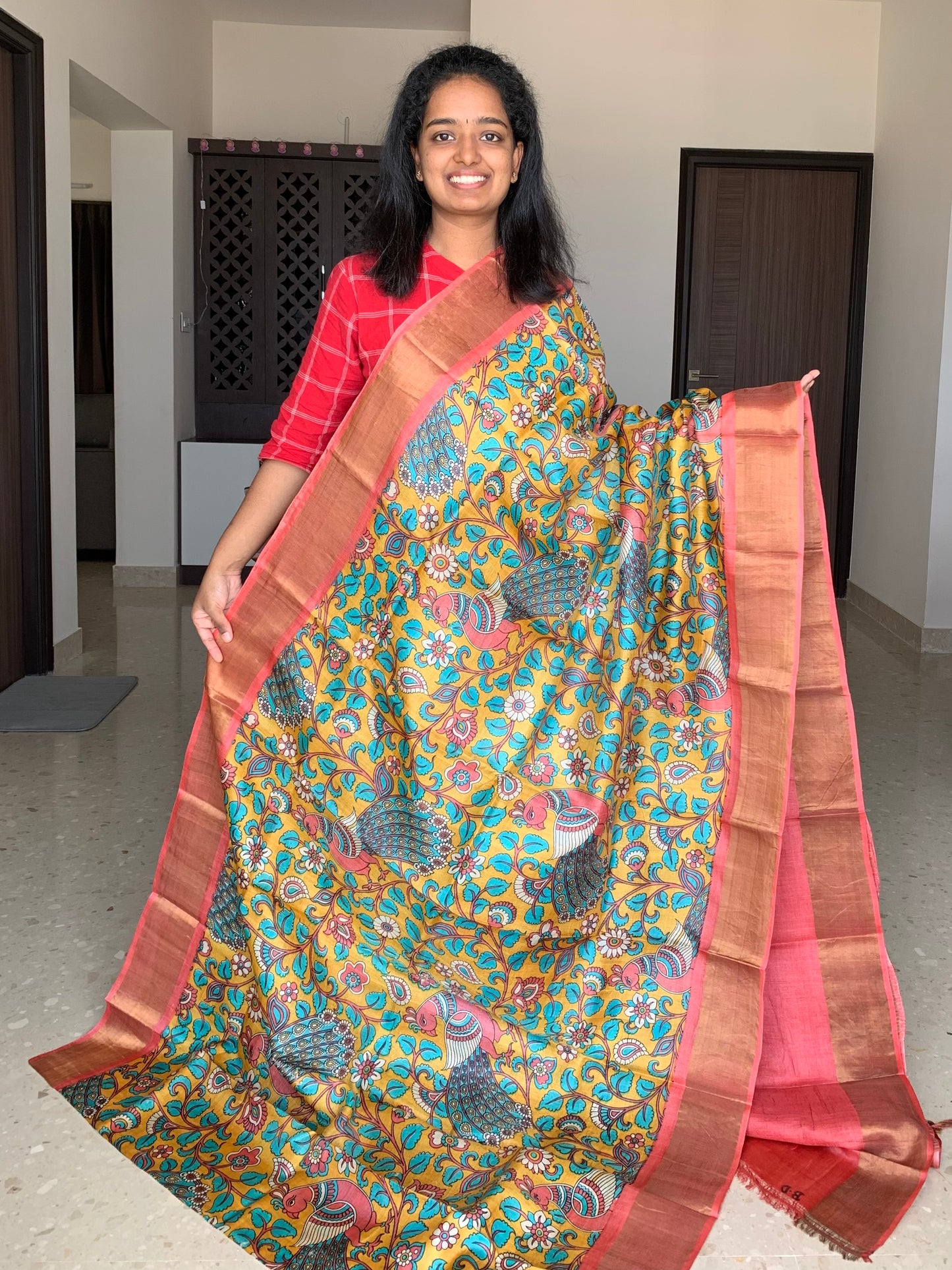 Yellow and Peach Tussar Silk Saree with Kalamkaari Prints
