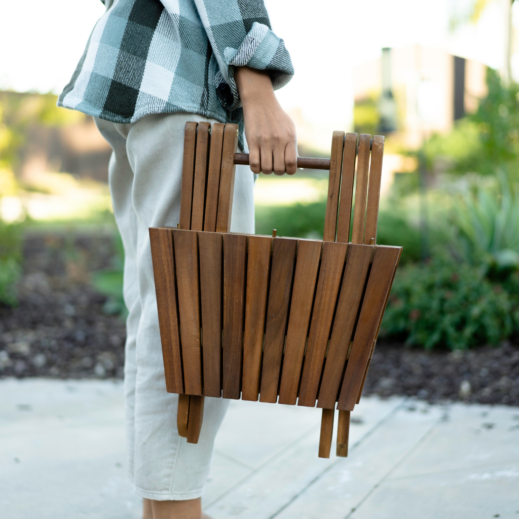 Tamarack Table folded and being carried