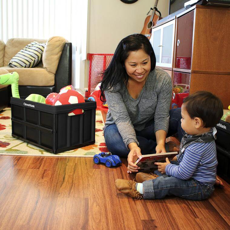 woman and son next to a CleverCrate® Storage Bin filled with toys