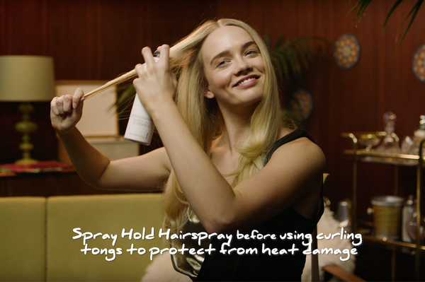 Use hair spray to add hold and heat protection