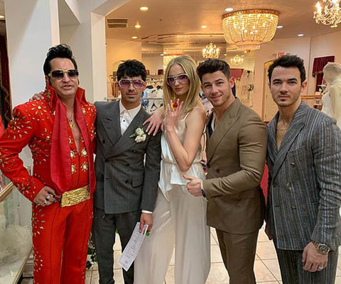 Elizabeth Grace Couture Blog. Sophie Turner wearing a bridal jumpsuit to her Las Vegas surprise wedding to Joe Jonas