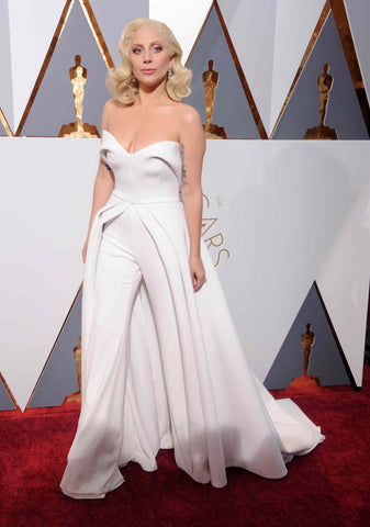 Lady Gaga in Brandon Maxwell bridal inspired jumpsuit for the Oscars