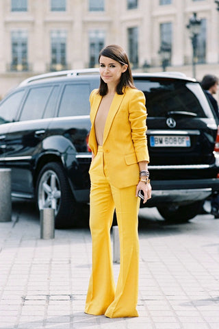 Mira Duma in yellow suit