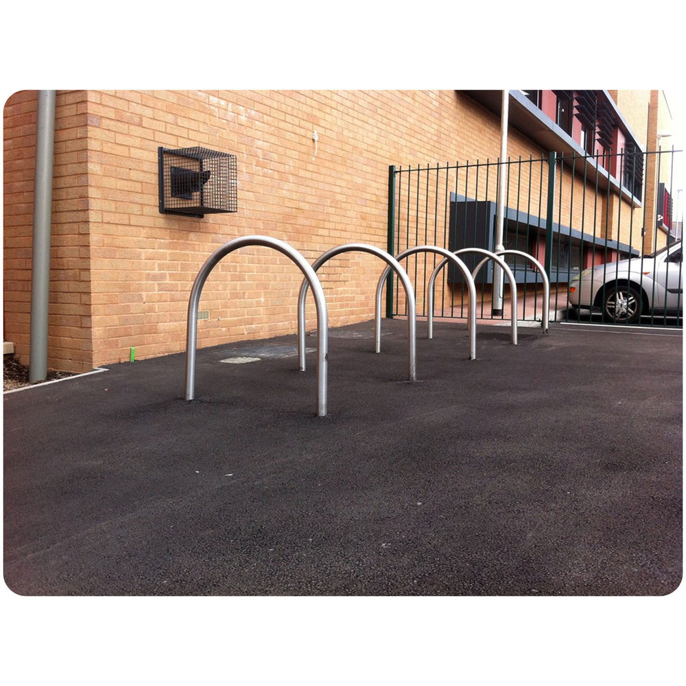 kirby-hoop-bike-stand-cycle-bicycle-storage-parking-rack-galvanised-stainless-steel-powder-coated-custom-RAL-durable-industrial-outdoor-sturdy-schools-highschool-college-university-public-spaces