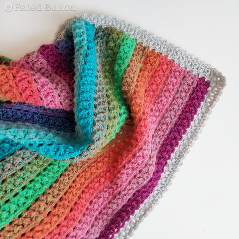 Elan Blanket crochet pattern designed by Susan Carlson of Felted Button | colorful crochet patterns | using Scheepjes River Washed and Scheepjes Colour Crafter