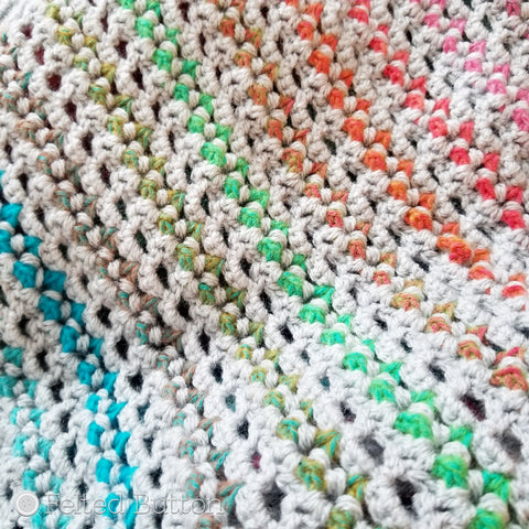 Elan Blanket crochet pattern designed by Susan Carlson of Felted Button | colorful crochet patterns | using Scheepjes River Washed and Scheepjes Colour Crafter