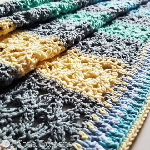 Up close picture of texture of Under the Awning Blanket crochet pattern by Susan Carlson of Felted Button | Colorful Crochet Patterns | cabana-striped throw in yellows, greens, blues and greys