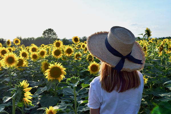 Evening at a sunflowers field. Vocco. Slow fashion.