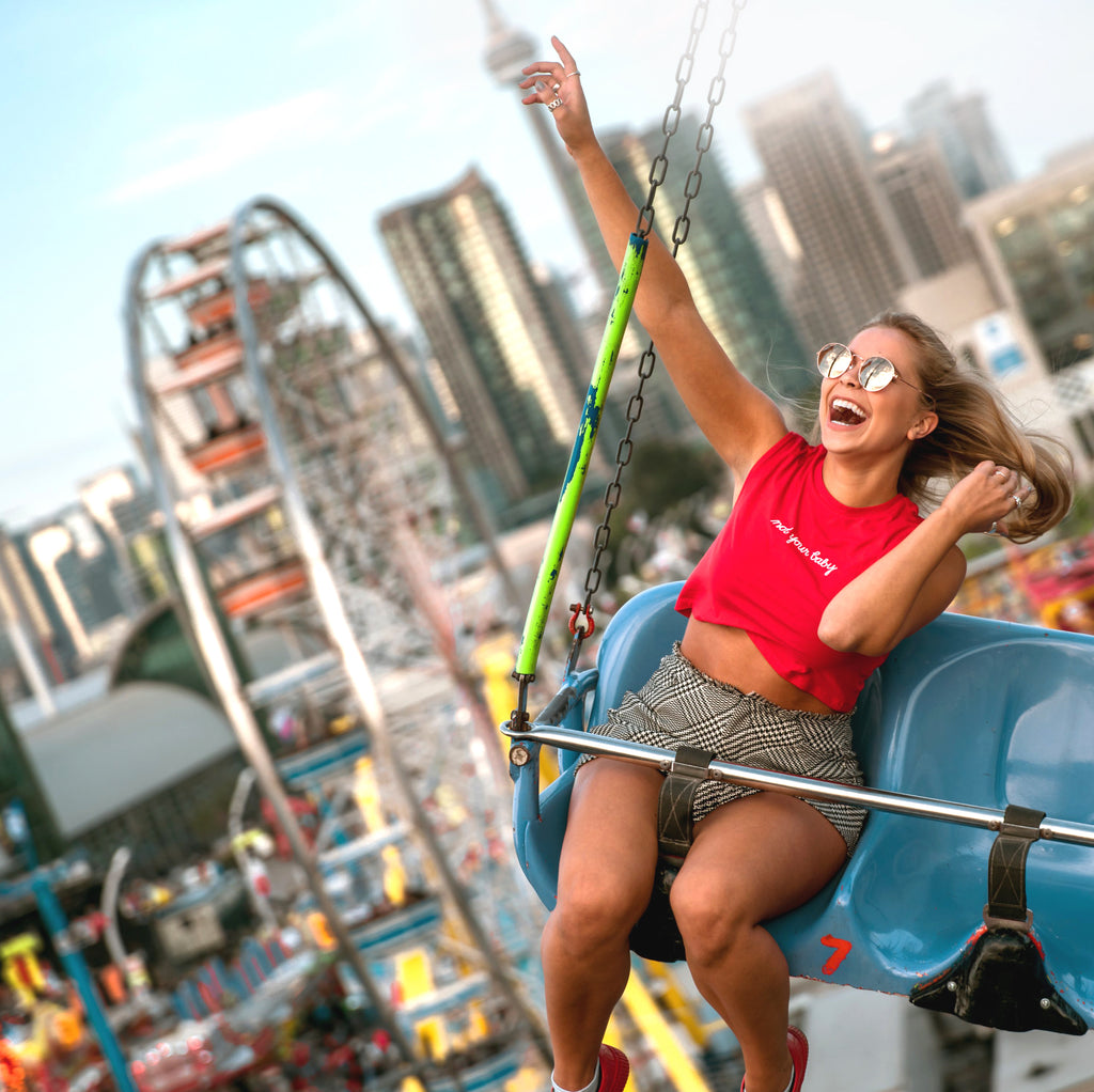woman having fun on carnival ride