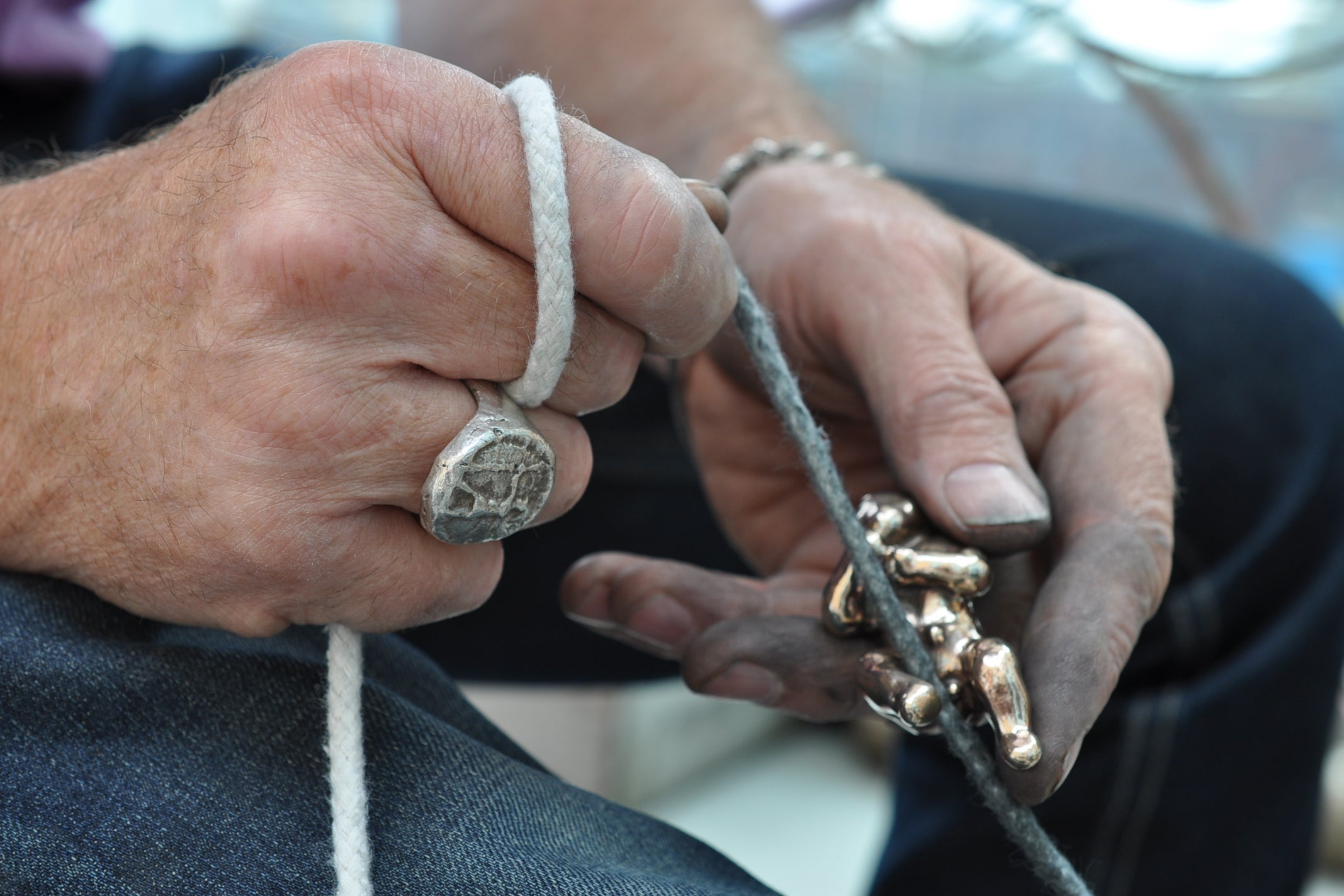 Artist handpolishing a piece of sculpture