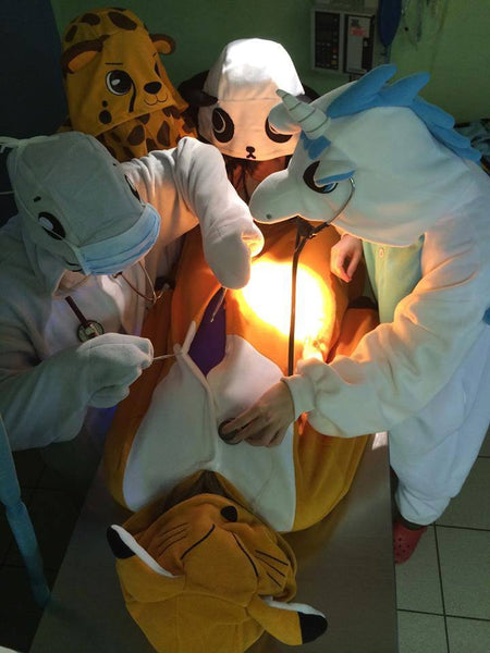 animal kigurumi having a operation