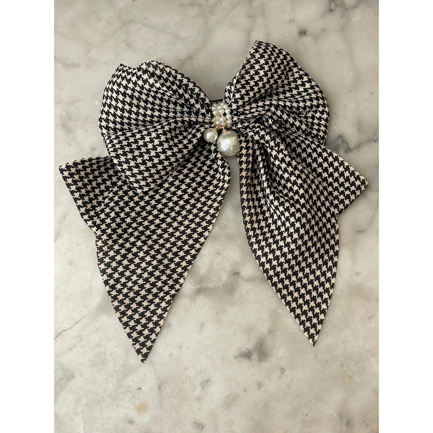 Hound tooth bow